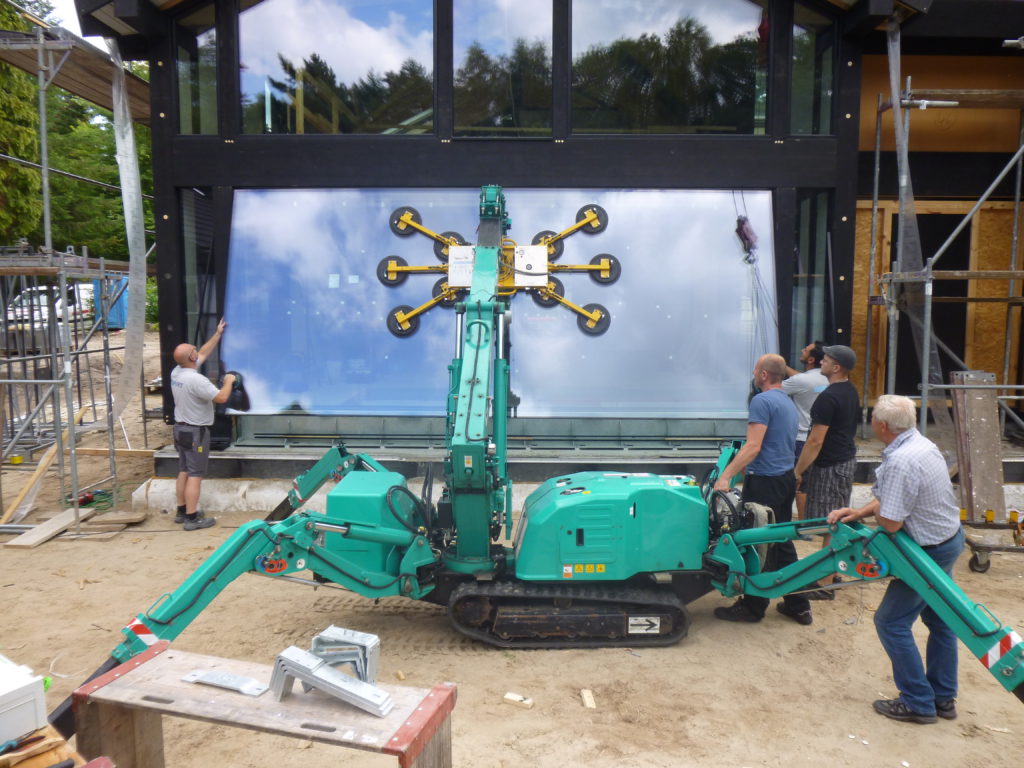 Das etwas andere Detmolder Fachwerkhaus - Holzskeletthaus mit versenkbaren Glasfronten und Autohebebühne