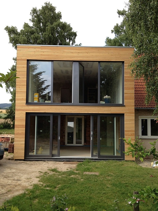 Fassade aus Holz – Moderner Holzbau in Ostwestfalen Lippe - Wohnraumerweiterung mit Holzfassade.