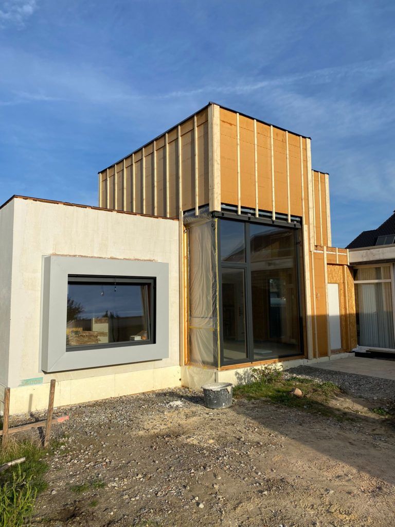 Flachdachanbau in Detmold - Erweitern Sie Ihren Wohnraum durch einen modernen Anbau im Holzrahmenbau.