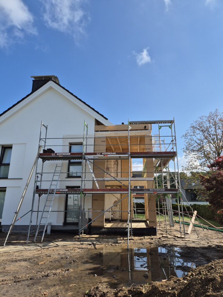 Anbau an ein Einfamilienhaus Anbau an ein Einfamilienhaus - Rückbau und moderner Neubau